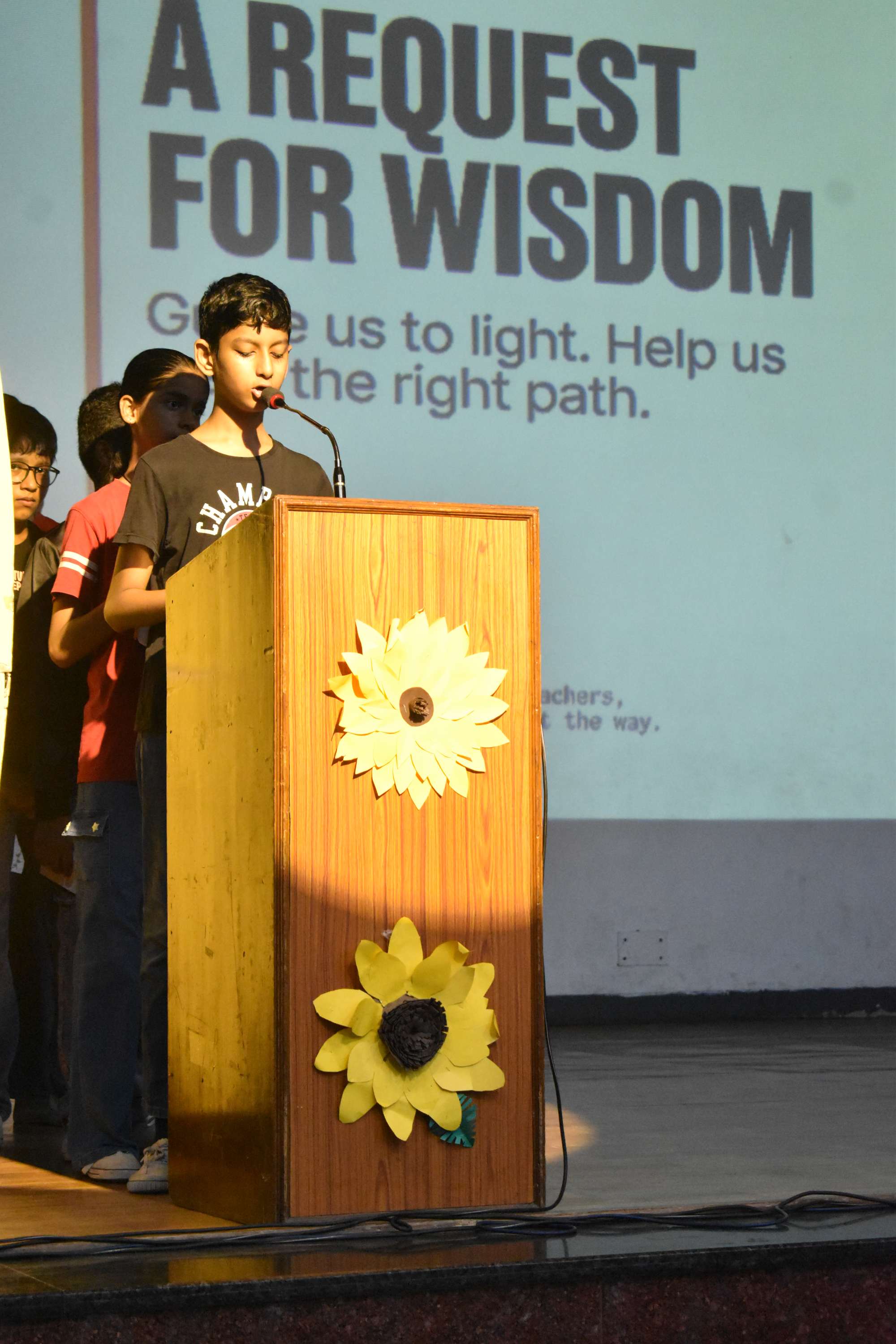 Assembly by Class 7C on Importance of Reading Habit