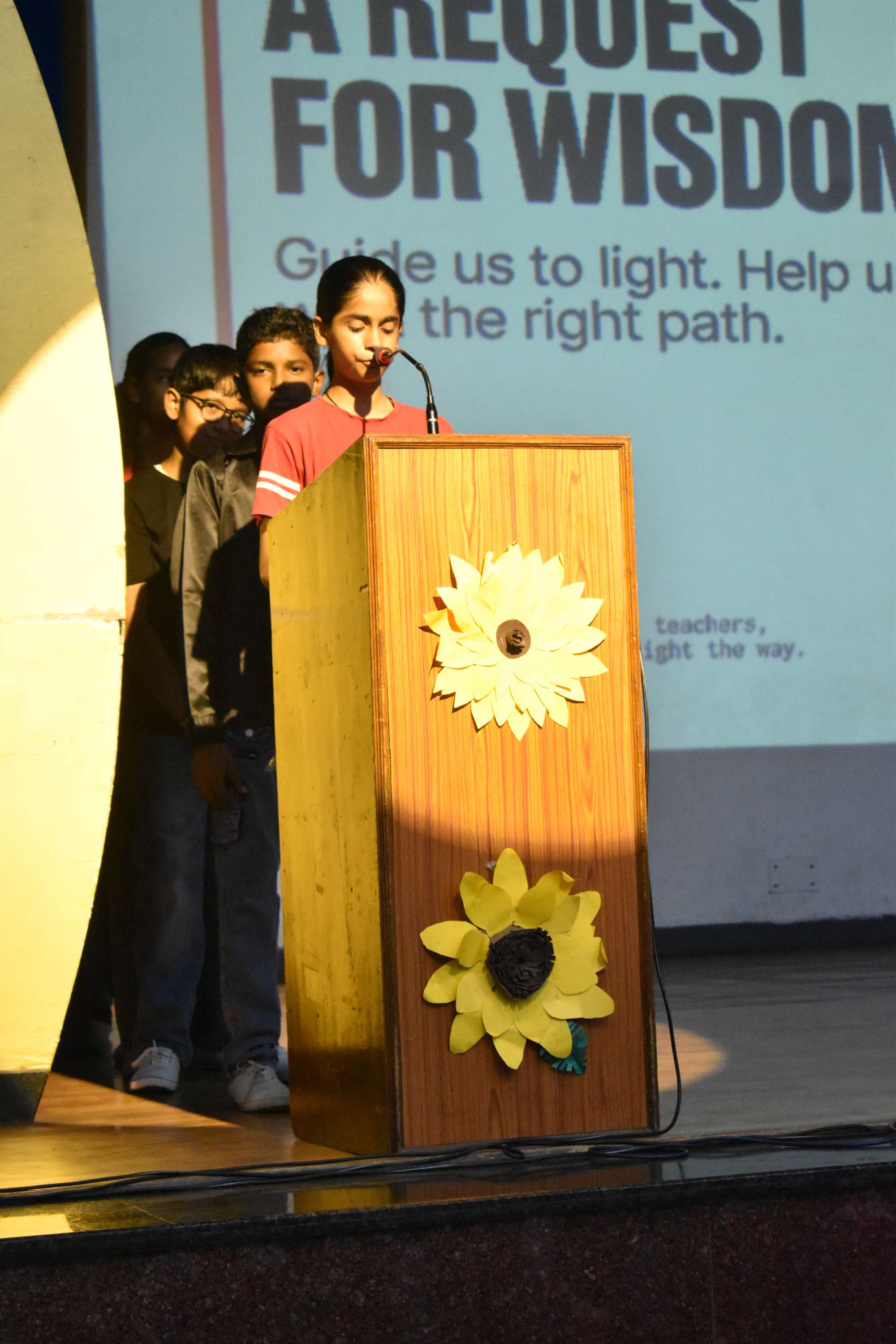 Assembly by Class 7C on Importance of Reading Habit