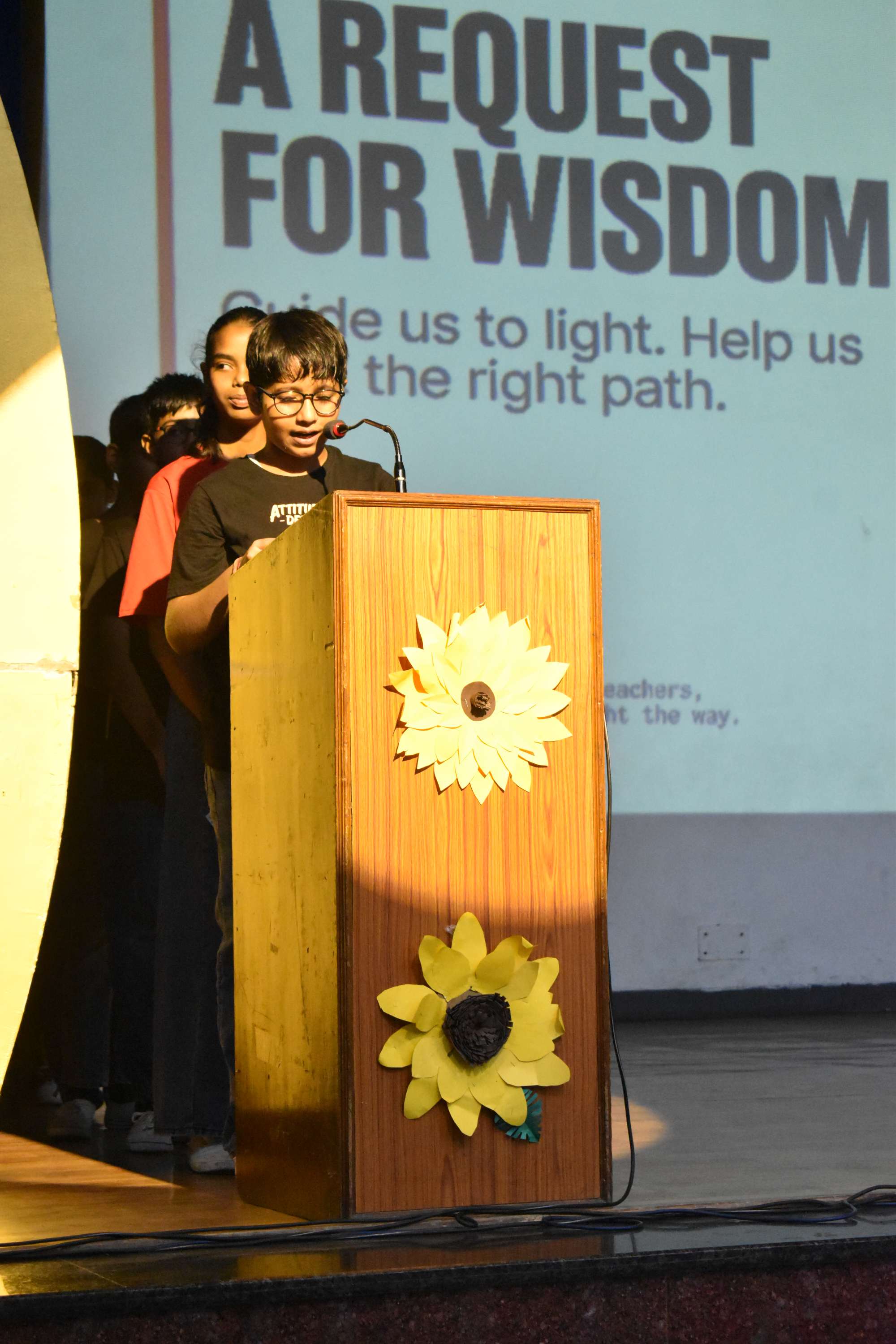 Assembly by Class 7C on Importance of Reading Habit